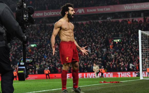 Liverpool sigue su vuelo hacia el título de la Premier League al cosechar este domingo una importante victoria en Anfield ante el Manchester United (2-0), en la 23ª jornada. Foto: AFP. 