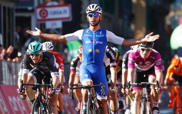 Fernando Gaviria tuvo una temporada inolvidable al lograr 14 victorias, cuatro de ellas en su debut en el Giro de Italia, en el que además fue ganador de la clasificación por puntos. FOTO AFP