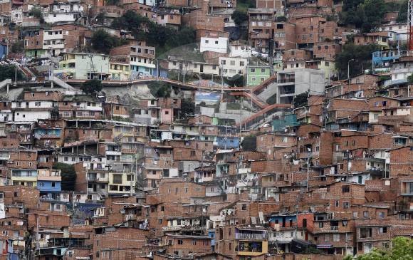 La comuna 13 es una de las zonas más beneficiadas con titulación en Medellín. FOTO Donaldo Zuluaga