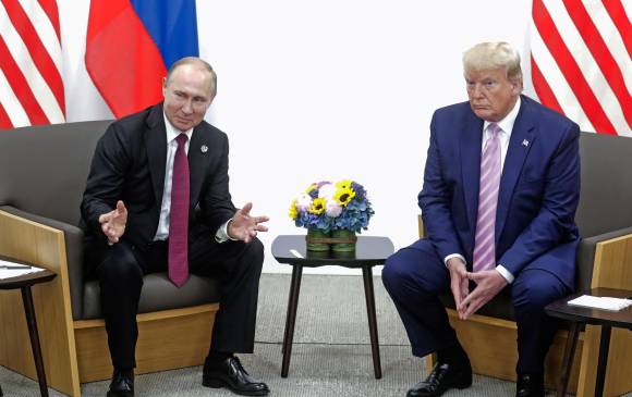 Los presidentes de Rusia, Vladimir Putin (izq), y de Estados Unidos, Donald Trump (der), tienen intereses en la crisis de Venezuela y buscan aliados en Suramérica. FOTO Getty