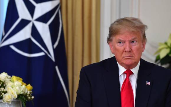 Ausente en la audiencia, el presidente de Estados Unidos, Donald Trump, calificó desde Londres el proceso como “algo muy malo para el país” y tildó de “broma” las evidencias. FOTO AFP