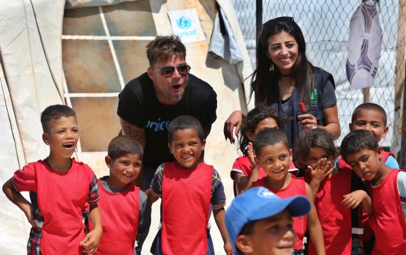 El puertorriqueño participó en las actividades que Unicef desarrolla con niños y adolescentes para ofrecerles un entorno seguro en los campos de refugiados. FOTO AP