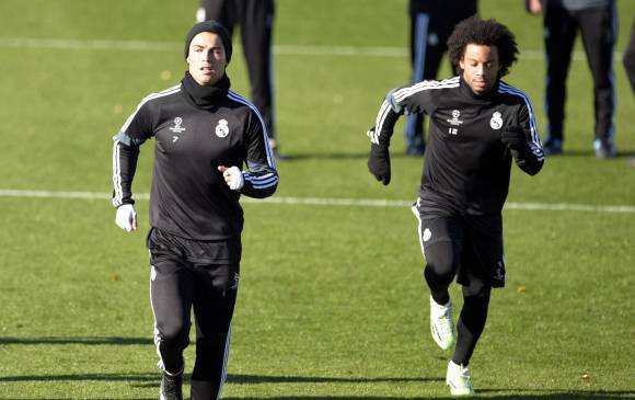 Cristiano Ronaldo, en la práctica con Marcelo, se prepara para romper más marcas en la Liga de Campeones. FOTO afp