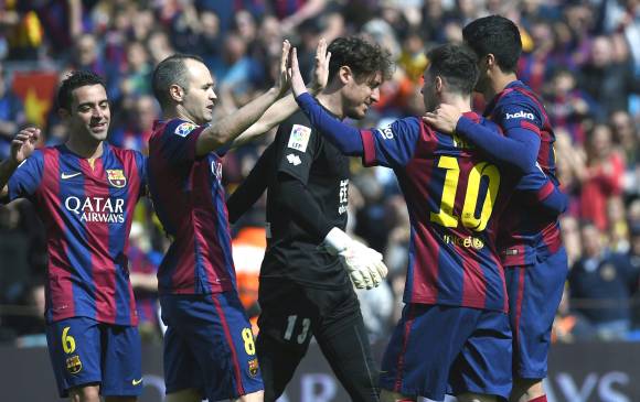 Los azulgranas comandan la tabla de posiciones con 62 puntos, uno más que el Real Madrid. FOTO AFP