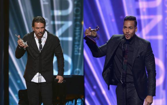 Ricardo Arjona y Romeo Santos durante la entrega de los Premios lo Nuestro. FOTO AFP