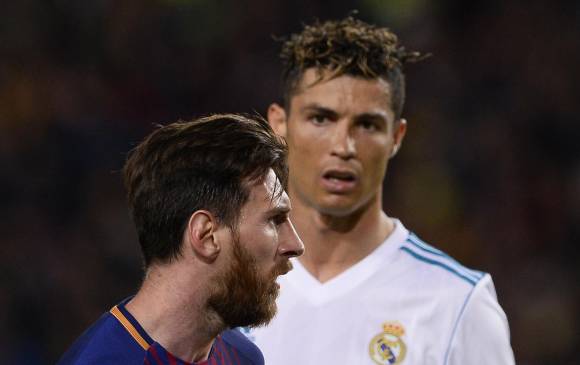 Cristiano Ronaldo y Lionel Messi son candidatos a ganar el premio a mejor jugador Uefa. FOTO AFP