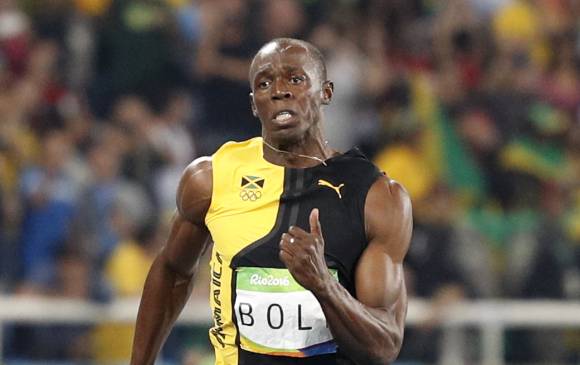 Usaín Bolt comparte patrocinador con el equipo. FOTO AFP