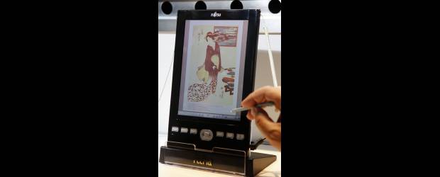 Escaner de libros para el iPad | Reuters | En un futuro los escáners permitirán digitalizar la propia biblioteca.