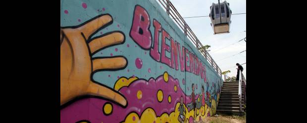 En el fin de la ciudad la bienvenida es a todo color | Manuel Saldarriaga | Este es uno de los murales, ubicados en el barrio La Divisa, que le dan la bienvenida a los deportistas que participan en los Juegos Surámericanos. Fue realizado por jóvenes y líderes comunitarios del sector de Vallejuelos, La Divisa y Las Flores.