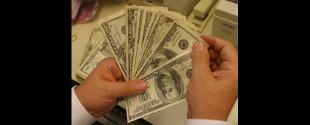 Dólar corrige alza del martes | Archivo | El dólar cerró a 1.873,5 pesos, 10,4 pesos por debajo del cierre anterior.