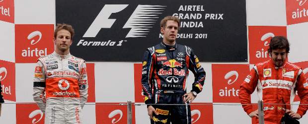 Sebastian Vettel venció en la India, Fernando Alonso fue tercero | AP | El podio del Gran Premio de India, con el campeón Sebastian Vettel en el centro, a la izquierda el segundo de la carrera Jenson Button, y a la derecha Fernando Alonso, tercero este domingo.
