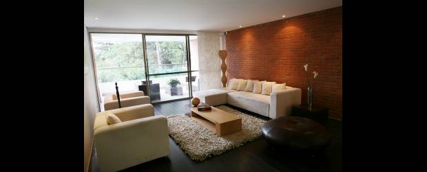 Personalice su apartamento nuevo antes de habitarlo | EL COLOMBIANO | Salas amplias permiten construir una chimenea. De esta manera el espacio cambia totalmente.