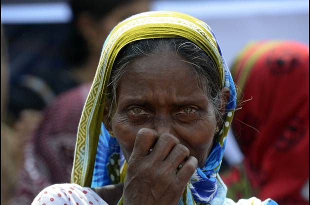 AFP - Familias de las v&#237;ctimas del edificio Rana Plaza en Bangladesh, que colaps&#243; el a&#241;o pasado, los recuerdan en el primer aniversario.