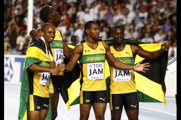 Reuters - El cuarteto integrado por Nesta Carter, Michael Frater, Yohan Blake y Bolt mejor&#243; la marca de 37,10 segundos con la que el equipo jamaiquino hab&#237;a ganado el oro en los Juegos Ol&#237;mpicos de Pek&#237;n 2008 para retener su t&#237;tulo mundial.