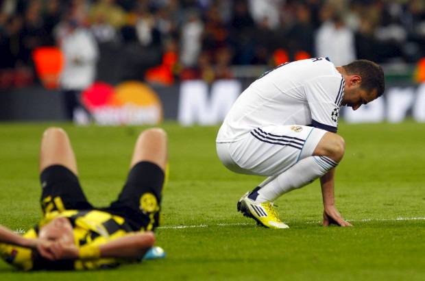AP - La &#233;pica madridista no pudo tumbar a un firme Borussia Dortmund, que hab&#237;a hecho la tarea en casa anotando cuatro goles.