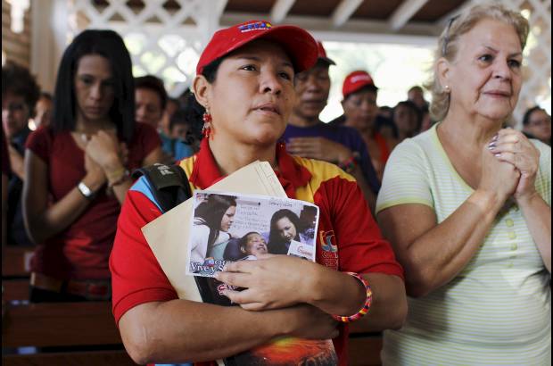 Reuters - Muchos seguidores recordaron a Chávez con fotos y camisetas con su rostro estampado.
