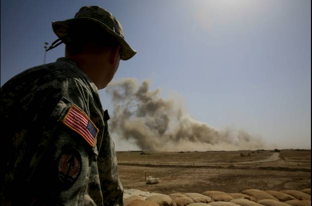 AP - Detonaci&#243;n de 24 toneladas de municiones a unos 100 kil&#243;metros al sureste de Bagdad el 10 de junio de 2007.