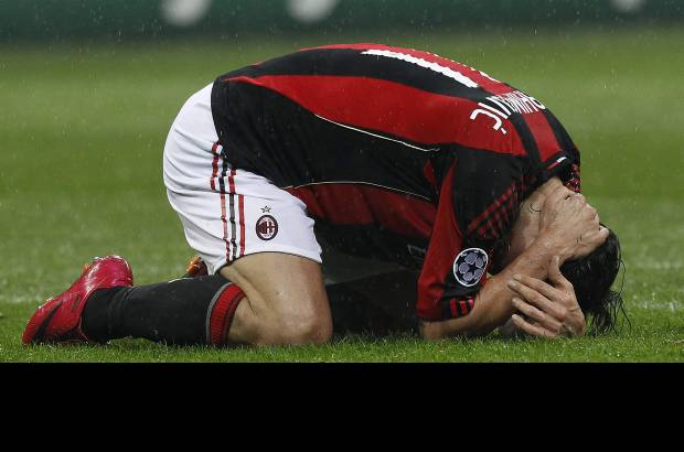 Reuters - Encuentro de ida de los octavos de final de la Liga de Campeones disputado en el estadio San Siro de Milan ante unos 80.000 espectadores.
