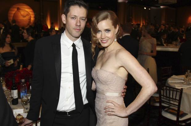 AP - Amy Adams desfiló con un Marchesa de tul con pedrería y corte sirena, peinado años 20 con recogido lateral y ondas al agua, además de zapatos con plataforma en nude.