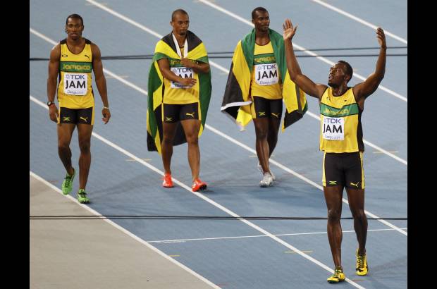Reuters - Usain Bolt y Jamaica cerraron el Mundial de atletismo con broche de oro al batir la plusmarca del relevo 4x100.