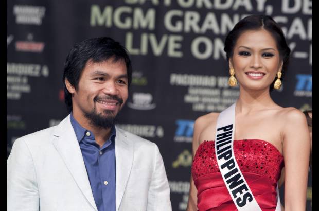Foto Reuters - Miss Filipinas, Janine Tugonon, con el boxeador Manny Pacquiao.