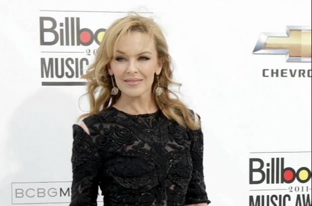 Archivo Reuters - La estrella del pop australiana Kylie Minogue, de 44 a&#241;os, fue diagnosticada con c&#225;ncer de pecho en el 2005, fue operada y se someti&#243; a quimioterapia. Su &quot;Showgirl Homecoming Tour&quot; 2006 represent&#243; su regreso a los escenarios luego de la enfermedad.
