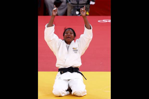 Foto Reuters - Pero llegar&#237;a la celebraci&#243;n principal. Yuri venci&#243; a la china Chen Fei y se llev&#243; el bronce.