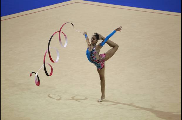 AP - Destreza y belleza en las pruebas de gimnasia.