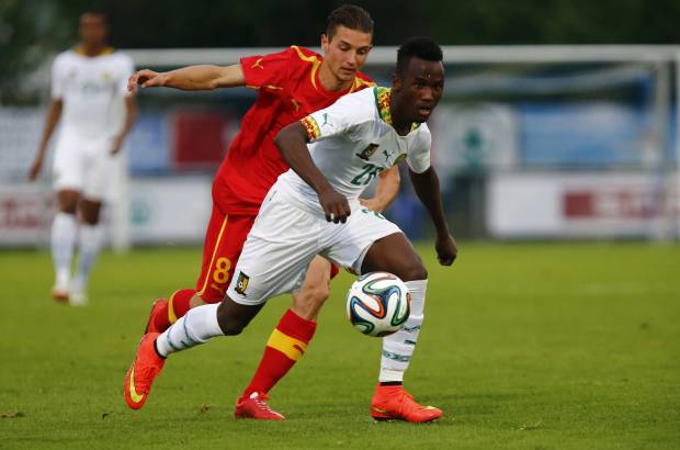 FOTO AFP - El camerunés Fabrice Olinga Essono es el jugador más joven de la Copa del Mundo, tiene 18 años (12-05-1996) y actualmente pertenece al club SV Zulte Waregem de Bélgica.
