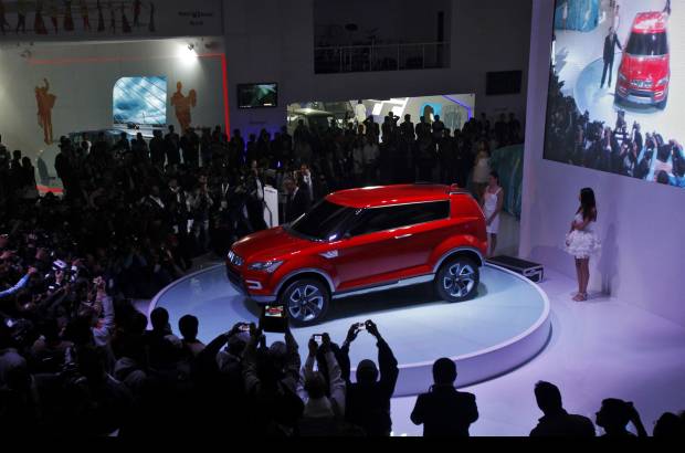 Reuters - Autos para todos los presupuestos son exhibidos en el centro de convenciones Pragati Maidan. Este Tata Pixel, por ejemplo, es considerado el carro más barato del mundo.