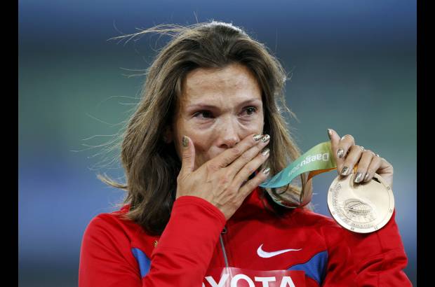 Reuters - Felicidad, reflejada en el rostro de la rusa Anastasiya Kapachinskaya al conquistar el bronce en los 400 metros.