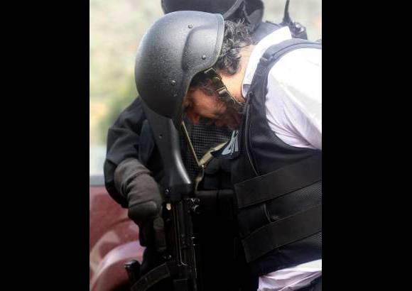 Reuters - Alias RQ fue sorprendido en una panader&#237;a del norte de Quito, Ecuador, cuando estaba reunido con un grupo de personas.