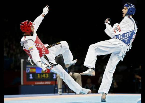 Reuters - Óscar Muñoz ganó la medalla de bronce en la categoría 58 kilogramos. El oro fue para Joel González.