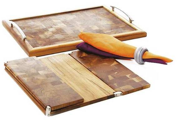 Distrihogar Tabla para quesos con pinchos - La madera llega de muchas formas: mesas livianas para desayunar sin salir de la cama, tablas para ofrecer quesos y bandejas e individuales en madera teca, resistentes a la humedad, se convierten en accesorios infaltables en la casa cuando se quiere sorprender al momento de servir.