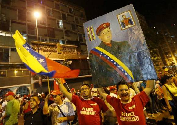 Reuters - El actual gobernante venezolano obtuvo en las urnas 7.444.082 votos frente al líder opositor Henrique Capriles, quien logró 6.151.544 sufragios a su favor, con el 90 por ciento de las mesas de votación escrutadas.