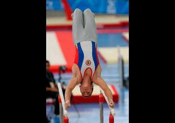 Juan Antonio S&#225;nchez - El gimnasta colombiano Jorge Hugo Giraldo se colg&#243; la medalla de oro en la clasificaci&#243;n general individual de art&#237;stica. Colombia tambi&#233;n alcanz&#243; platas con Didier Lugo y en equipos, en la que gan&#243; Brasil.