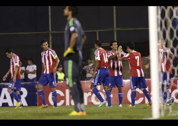 AP - Argentina es el primer seleccionado de Suram&#233;rica que se clasifica al Mundial. Paraguay jugaba sin esperanzas y ya eliminado.