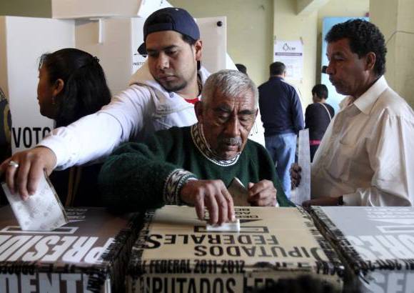 Reuters - Los centros electorales abrieron a partir de las 8:00 a.m. en la capital y en el centro de M&#233;xico. Luego lo hicieron progresivamente una y dos horas despu&#233;s en las regiones occidentales del pa&#237;s.