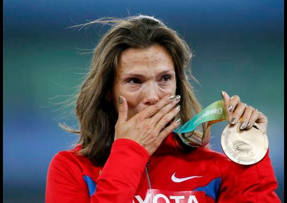 Reuters - Felicidad, reflejada en el rostro de la rusa Anastasiya Kapachinskaya al conquistar el bronce en los 400 metros.