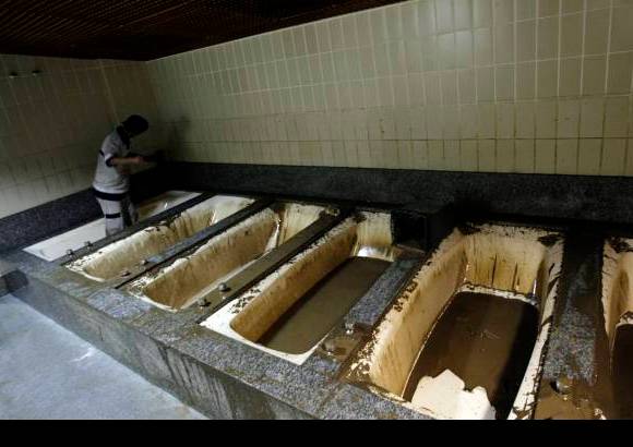 Reuters - R&#237;o comienza a recuperarse del caos causado por el fuerte aguacero, que inund&#243; incluso escenarios deportivos como el estadio Maracan&#225;.