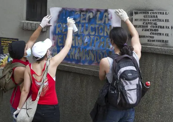 ESTEBAN VANEGAS - Las centrales obreras y grupos estudiantiles de las universidades Nacional y de Antioquia marcharon este 1 de mayo por las calles de Medell&#237;n, exigiendo garant&#237;as laborales al Gobierno Nacional. Al final de la movilizaci&#243;n se presentaron algunos enfrentamientos entre varios manifestantes y agentes de la Polic&#237;a.