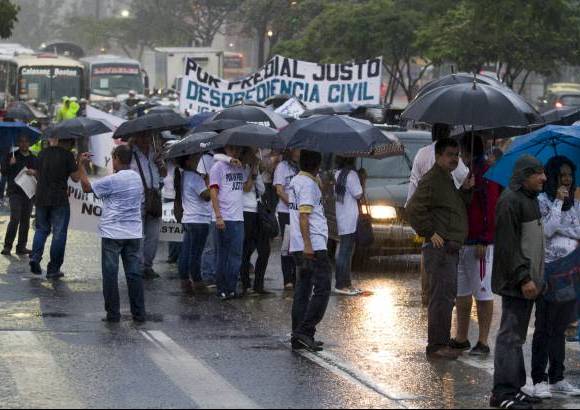 - Gran parte de la movilizaci&#243;n estuvo pasada por agua, situaci&#243;n que no les import&#243;.