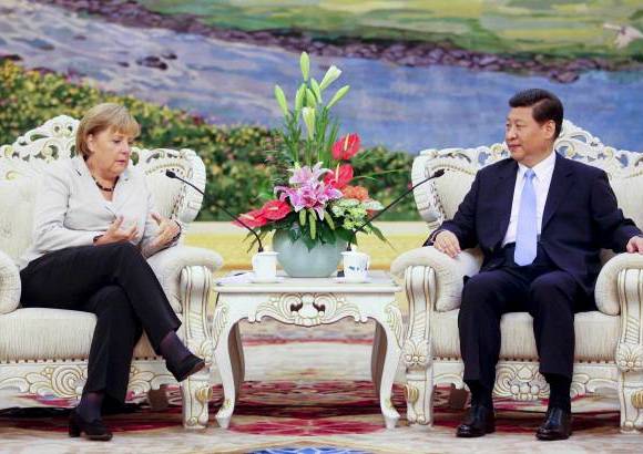 Archivo - El Congreso se cumple cada cinco a&#241;os y sus m&#225;ximos l&#237;deres son reemplazados una vez por d&#233;cada. Se trata del evento pol&#237;tico m&#225;s importante de China. En la foto Xi Jinping con la canciller de Alemania Angela Merkel.