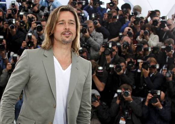Foto Reuters - Sonriente, con larga melena y chaqueta blanca el actor asegur&#243; que tanto a &#233;l como a Angelina Jolie les hubiera encantado estar juntos en Cannes, la actriz no ha podido venir porque est&#225; preparando su pr&#243;xima pel&#237;cula.