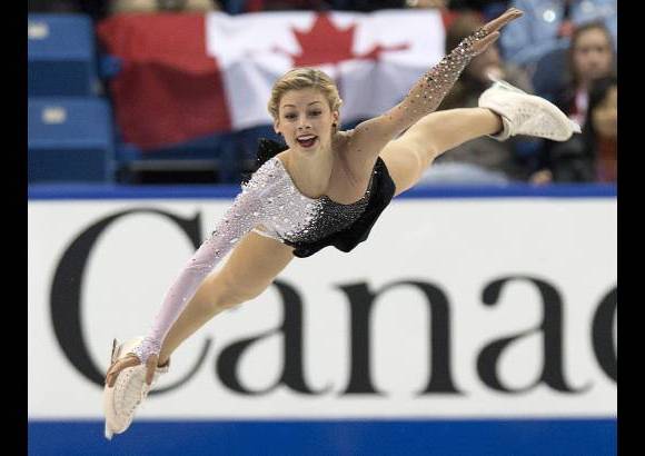 AP - Gracie Gold de Estados Unidos compite en el programa corto de patinaje sobre el hielo en Canada.