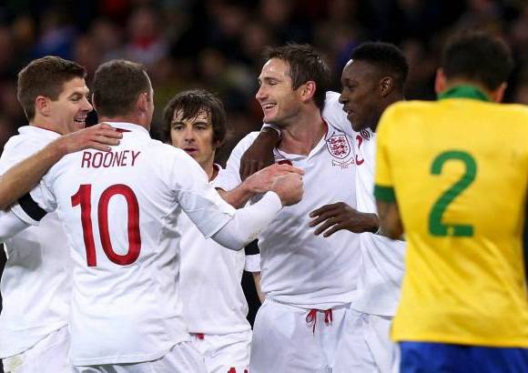 AP - Los goles de Wayne Rooney y Frank Lampard le sirvieron a Inglaterra para imponerse por 2-1 a la selecci&#243;n brasilera dirigida por Luiz Felipe Scolari.