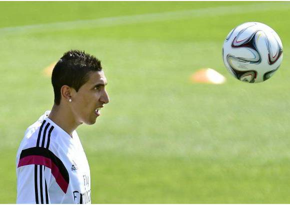 Afp - En lo que se refiere al resto de efectivos; Xabi Alonso, Coentrao y Di Mar&#237;a (en la foto) comenzaron ejercit&#225;ndose al margen en el tramo inicial si bien se incorporaron al resto del grupo con posterioridad.