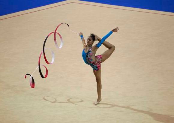 AP - Destreza y belleza en las pruebas de gimnasia.