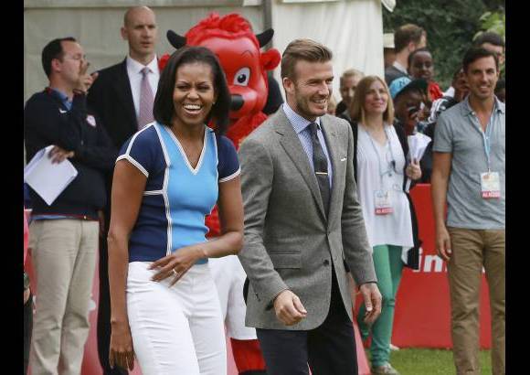 Reuters - La primera dama de Estados Unidos, Michelle Obama, compartió un rato con el futbolista David Beckham antes de la inauguración de los Juegos.