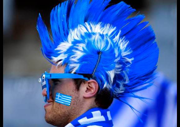 AP - Grecia sumó tres puntos de oro.